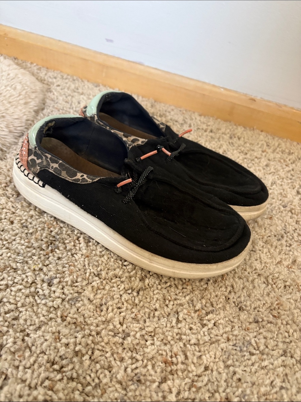 Hey Dude Women's Black Slip-On Loafers with Leopard Trim and Mint Heel